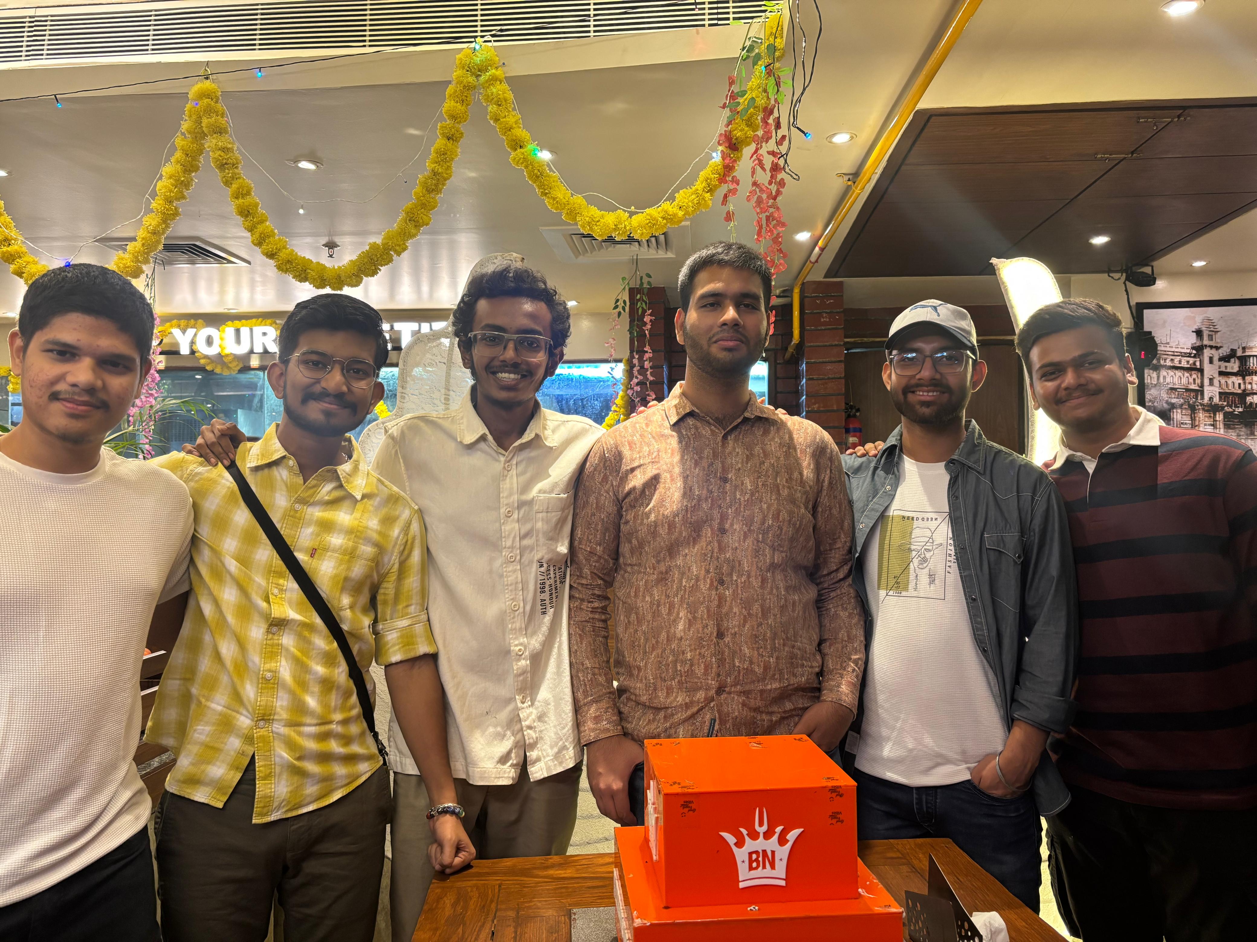 Memorable farewell team picture celebrating years of engineering camaraderie.